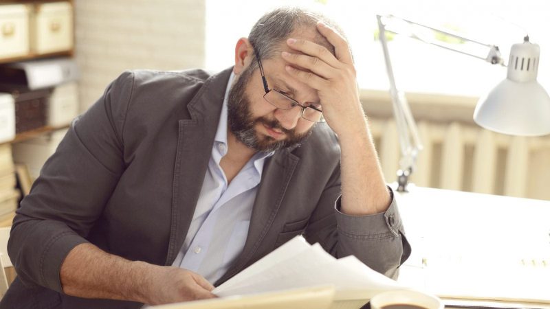 Adult Man Reading Stock Photo