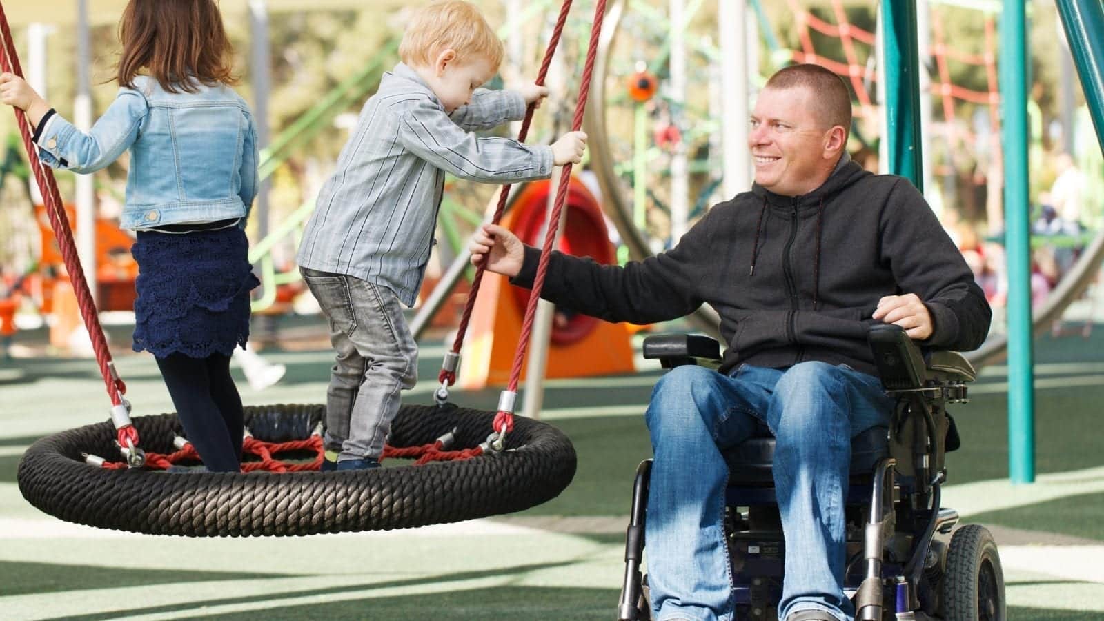 Disabled Father play with his little son and daughter