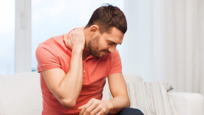 Neck Pain Stock Photo