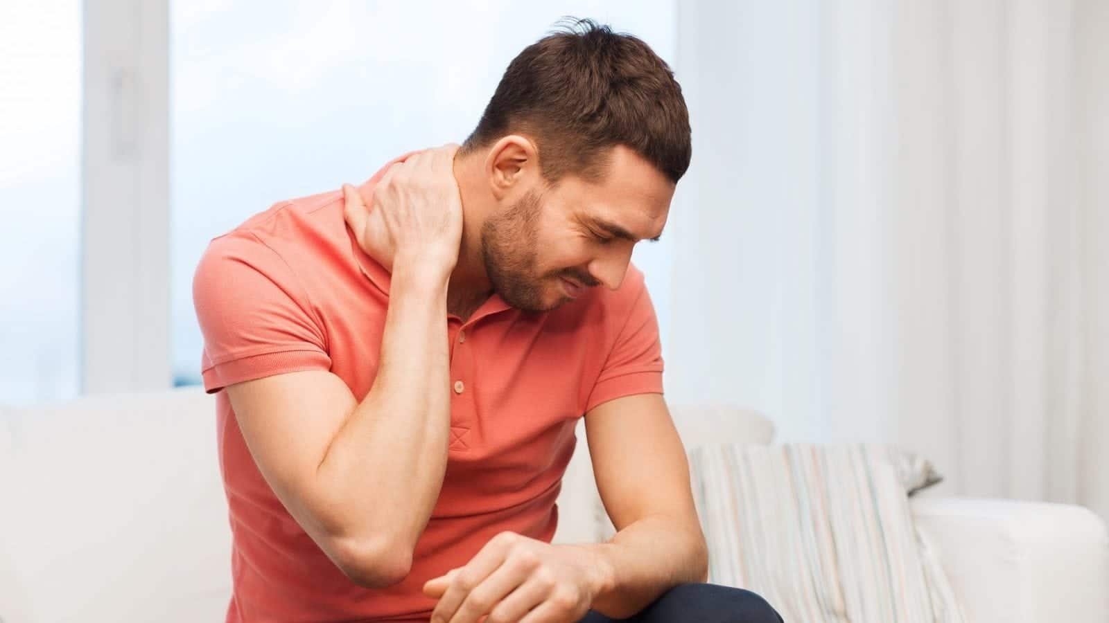 Neck Pain Stock Photo
