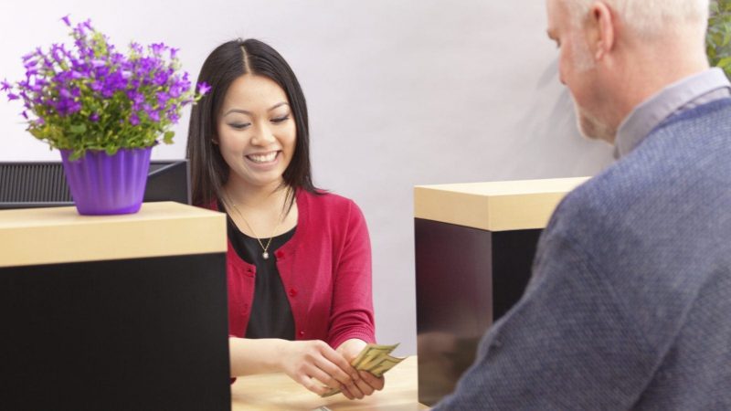 Bank Teller Stock Photo