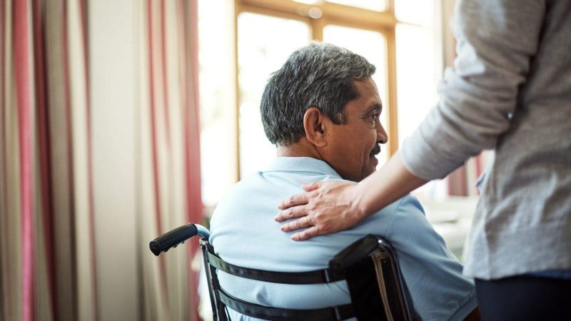 Senior Man In Wheelchair Stock Photo